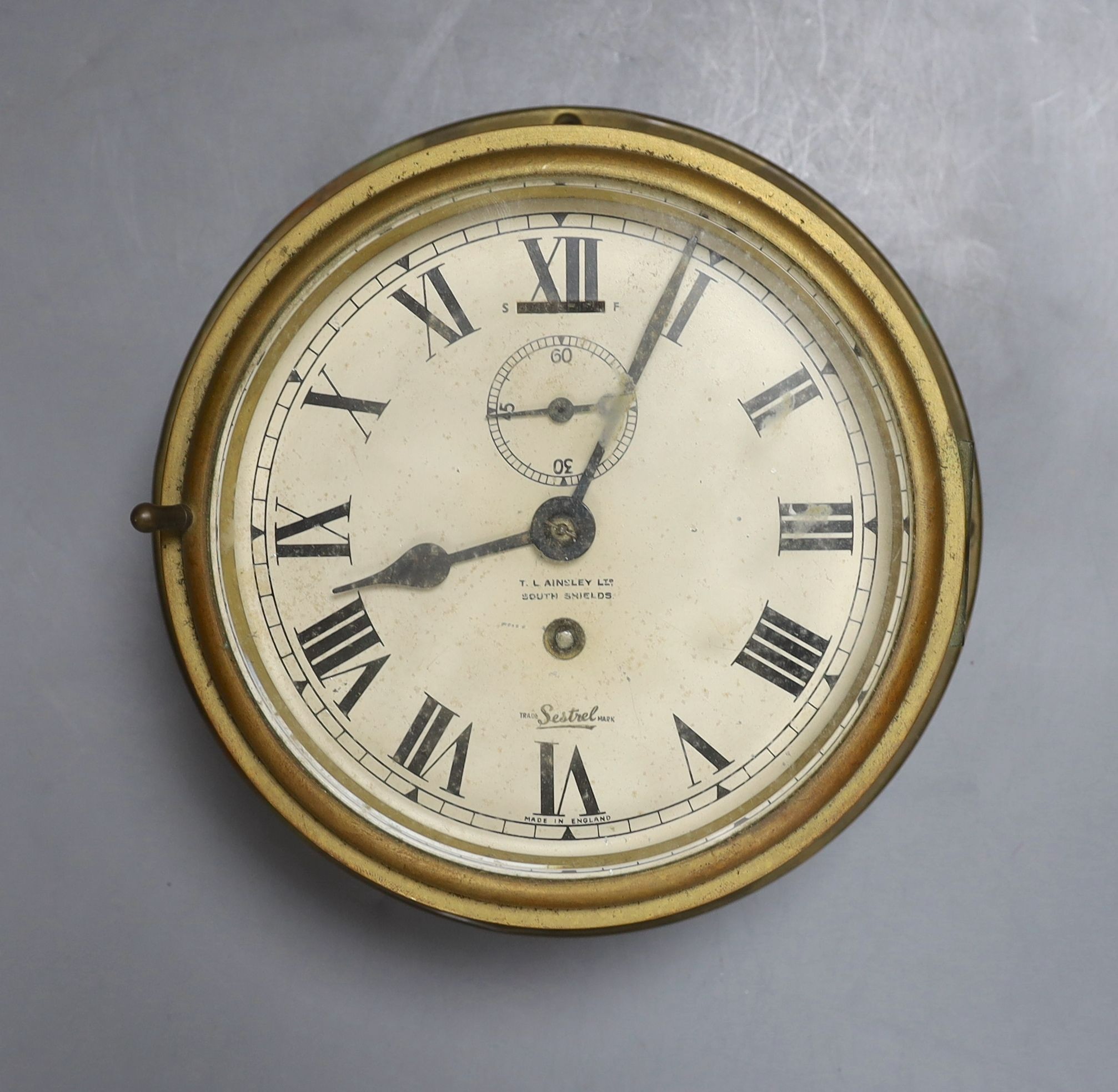 A Sestrel ship's wall clock, no key - 20cm diameter